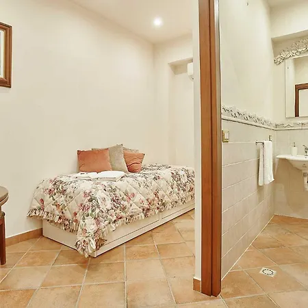 Quarto em Acomodações Particulares Laura *