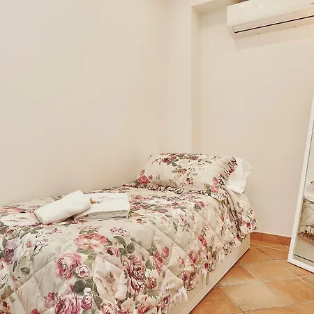Quarto em Acomodações Particulares Laura